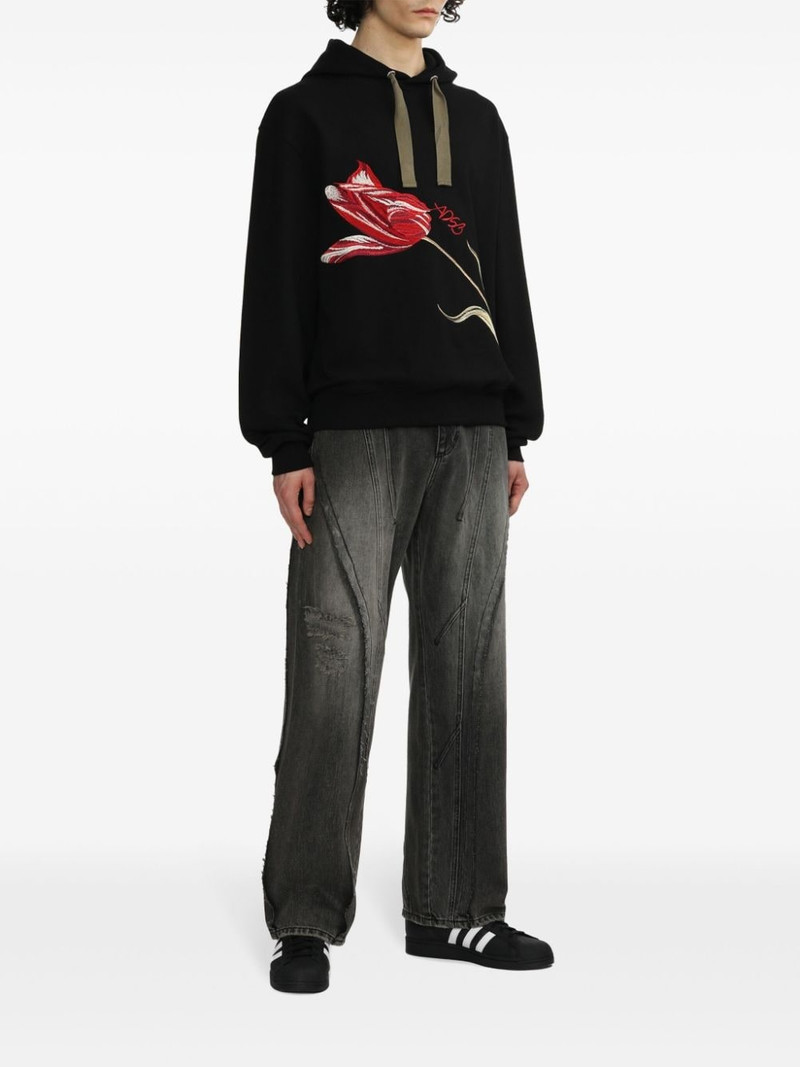 Andersson Bell ripped wide-leg jeans outlook