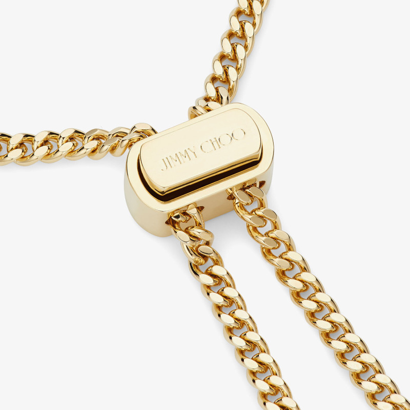 Bon Bon Bracelet
Gold-Finish Metal Bracelet with Pearl and JC Charm 4