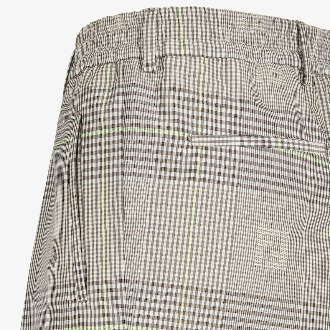 Cigarette trousers with elastic waistband and pleats on the front. Pockets on the sides and welt poc - 3