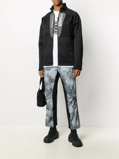 White Mountaineering x Colman AGE geometric print trousers outlook