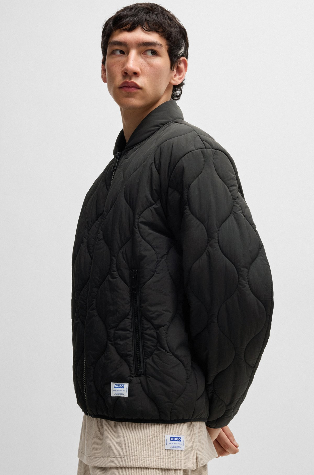 WATER-REPELLENT QUILTED JACKET WITH LOGO BADGE - 6