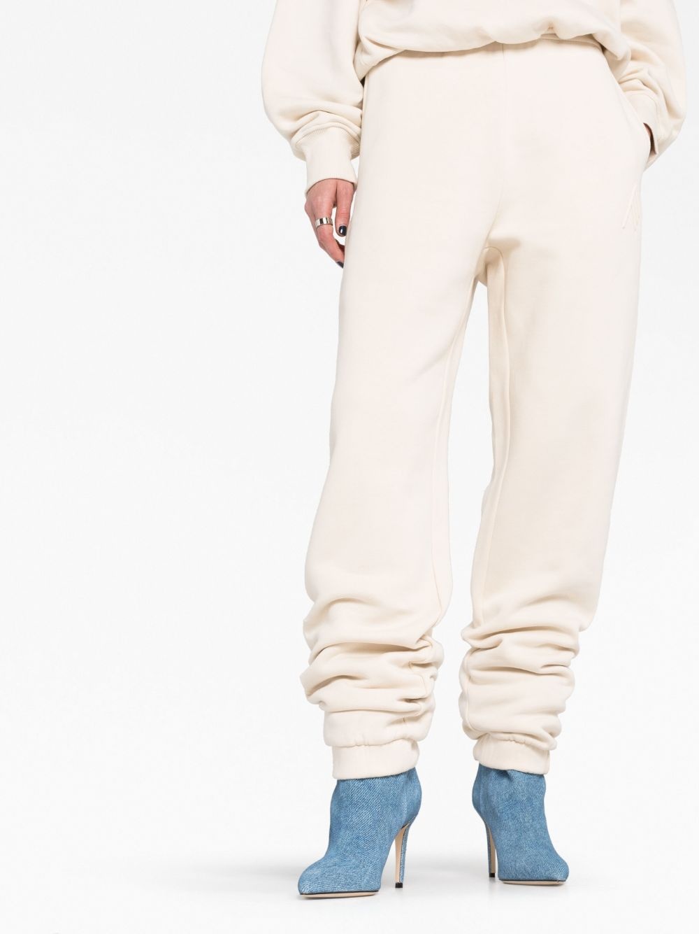 Penny logo-embossed cotton track pants - 5
