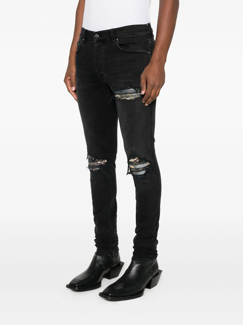 AMIRI Amiri Patchwork-distressed Cotton Jeans outlook