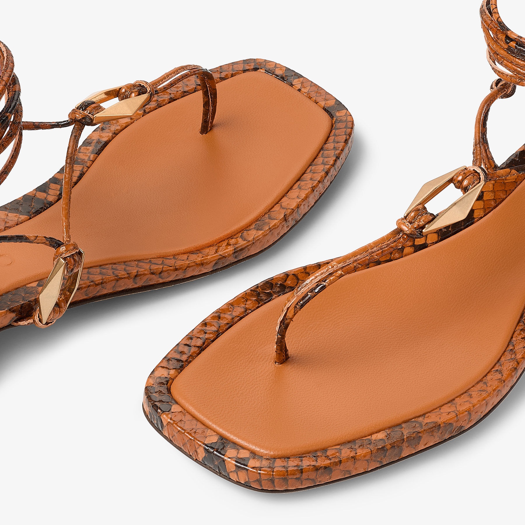 Onyxia Flat
Copper Snake Print Sandals - 3