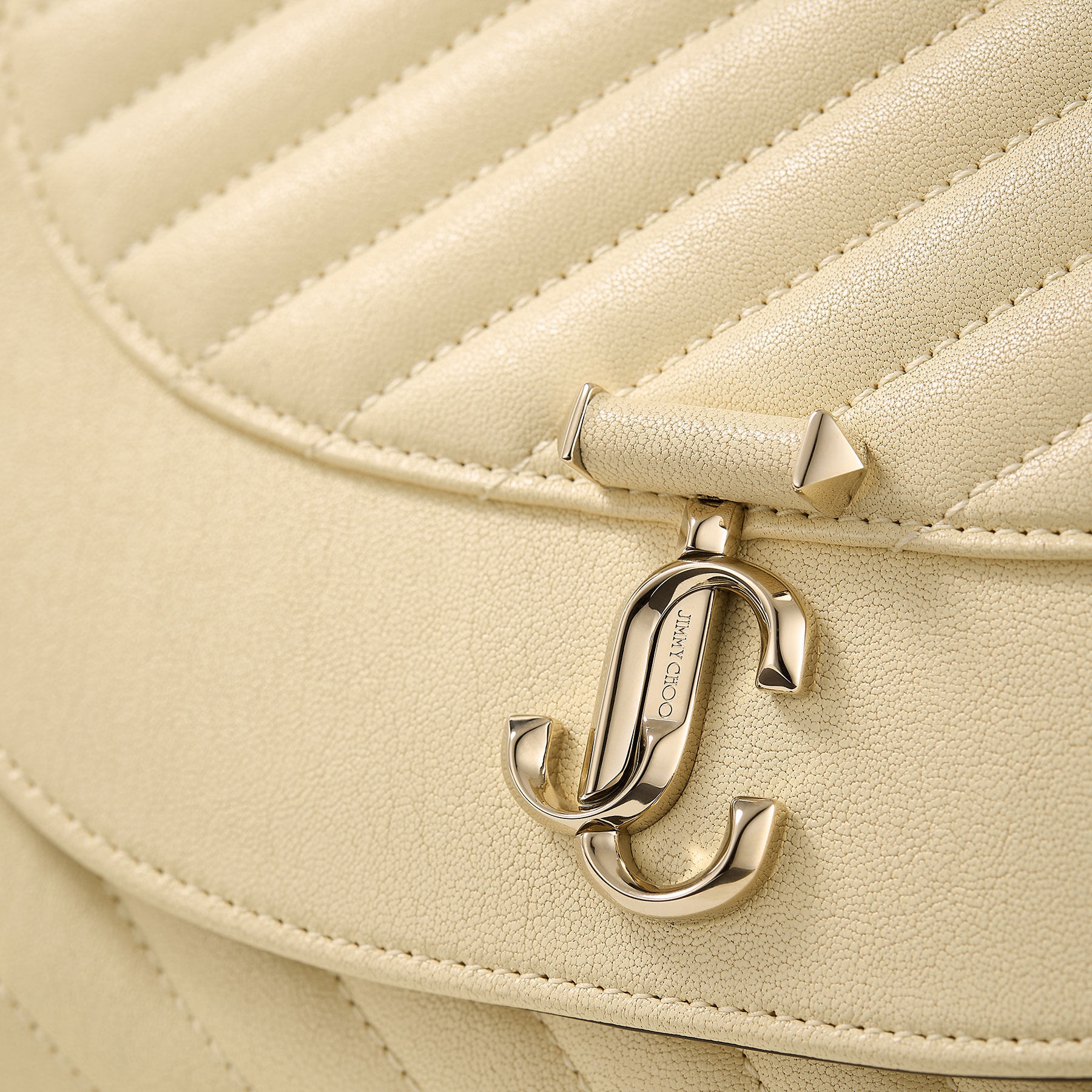 Avenue Curve Clutch
Buttermilk Quilted Biker Leather Clutch - 3