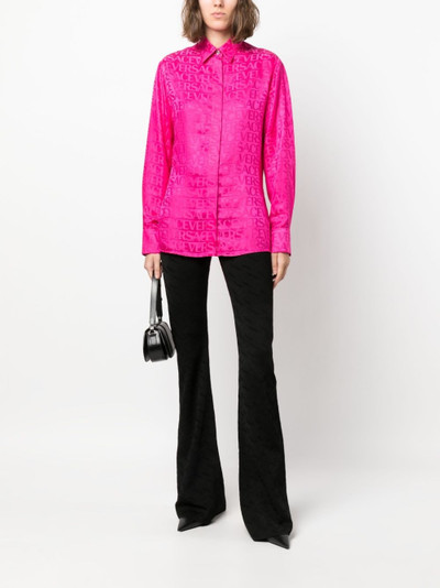 VERSACE Greca-knit flared trousers outlook