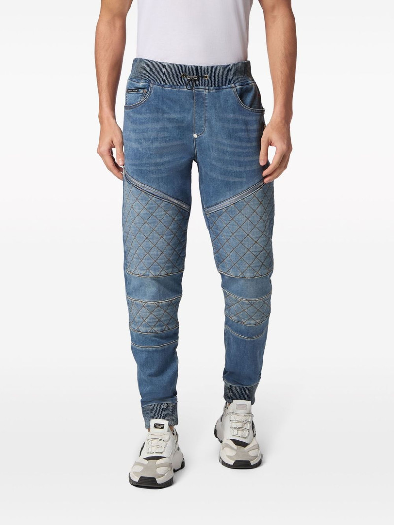 Jogging logo-appliquÃ© tapered jeans 3