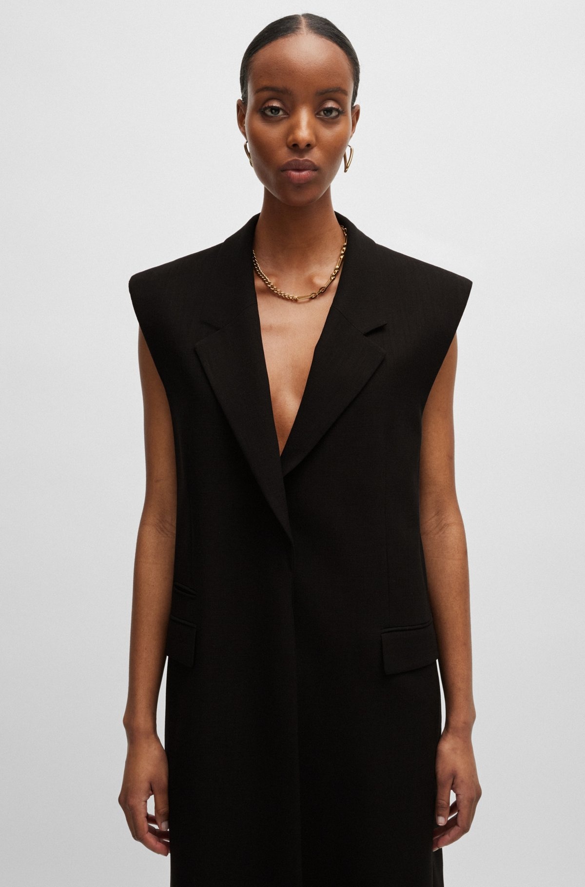 SLEEVELESS JACKET WITH CONCEALED CLOSURE AND SIGNATURE LINING - 5