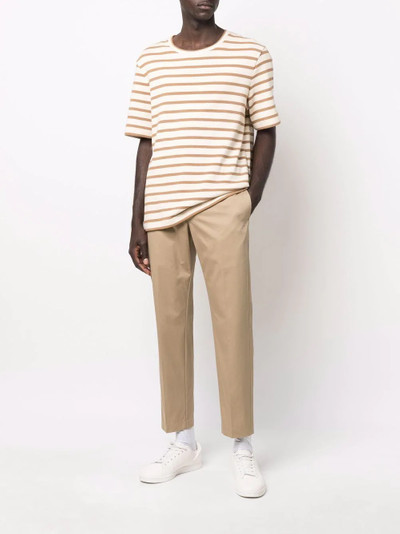 Prada triangle logo-patch chino trousers outlook