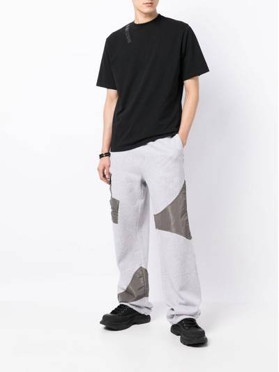 HELIOT EMIL™ organic-cotton patchwork track-pants outlook