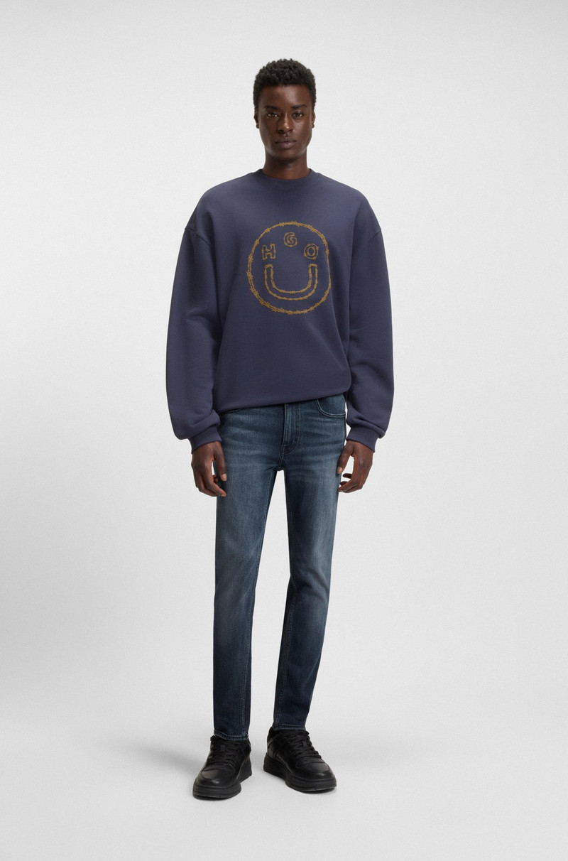 HUGO EXTRA-SLIM-FIT JEANS IN MID-BLUE STRETCH DENIM outlook