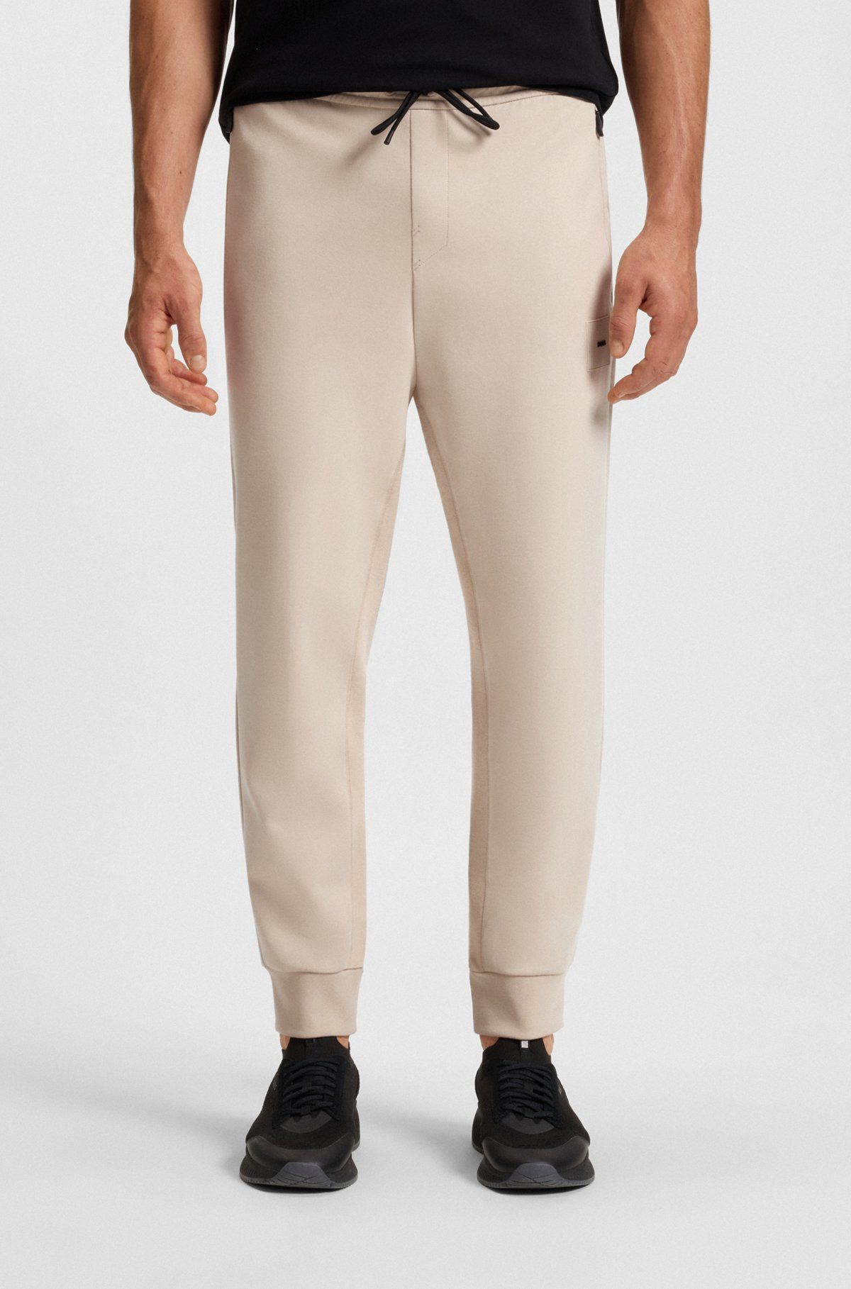 STRETCH TRACKSUIT BOTTOMS WITH LOGO PATCH - 2