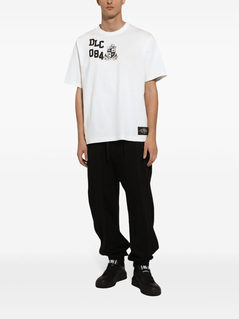 Dolce & Gabbana reverse-seams pleated track pants outlook