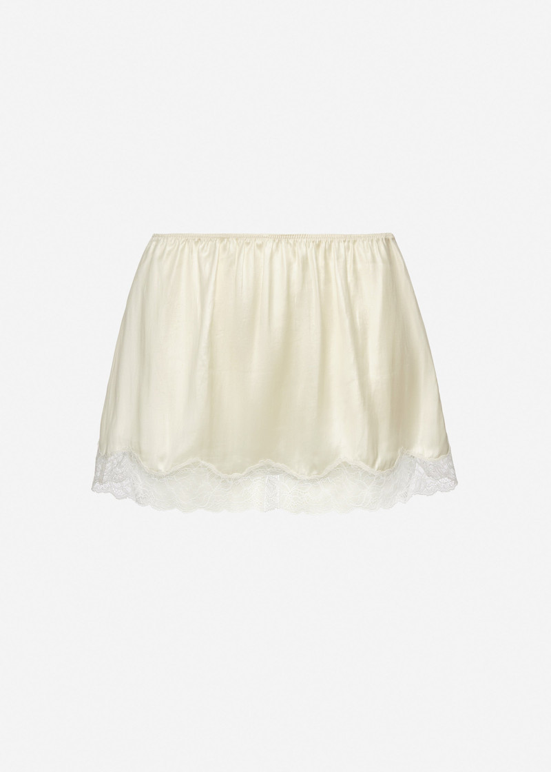 Mini slip skirt with lace-trimmed hem in cream 1