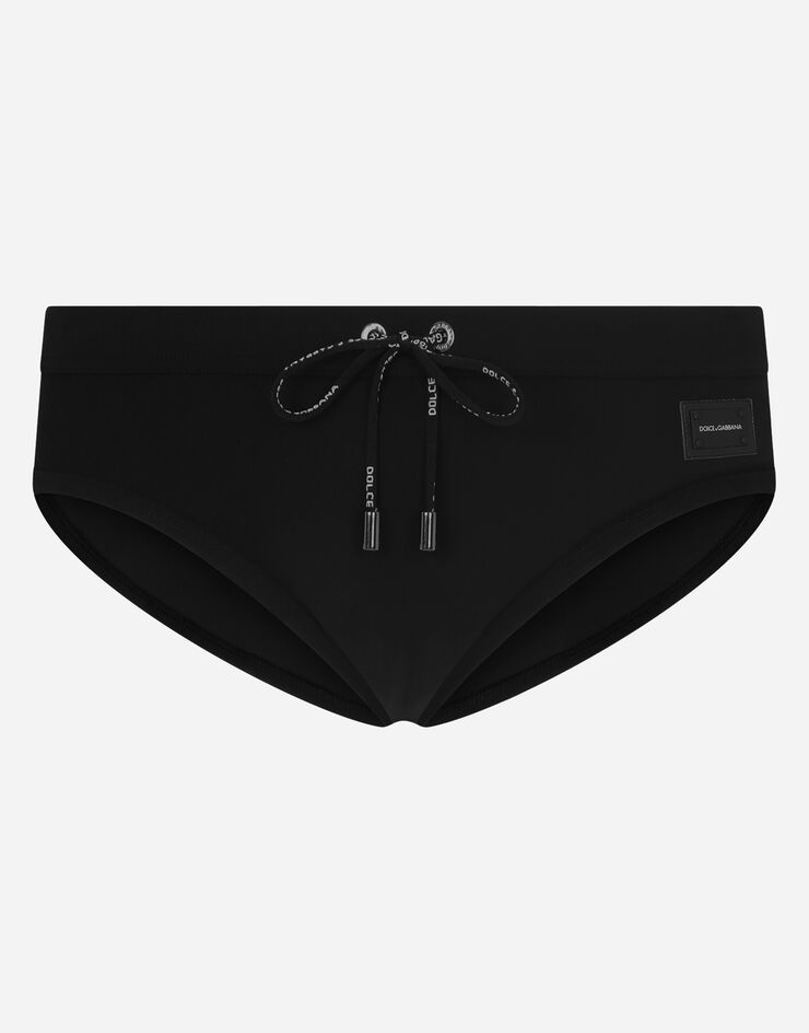 Swim briefs with high-cut leg and branded metal plate - 1