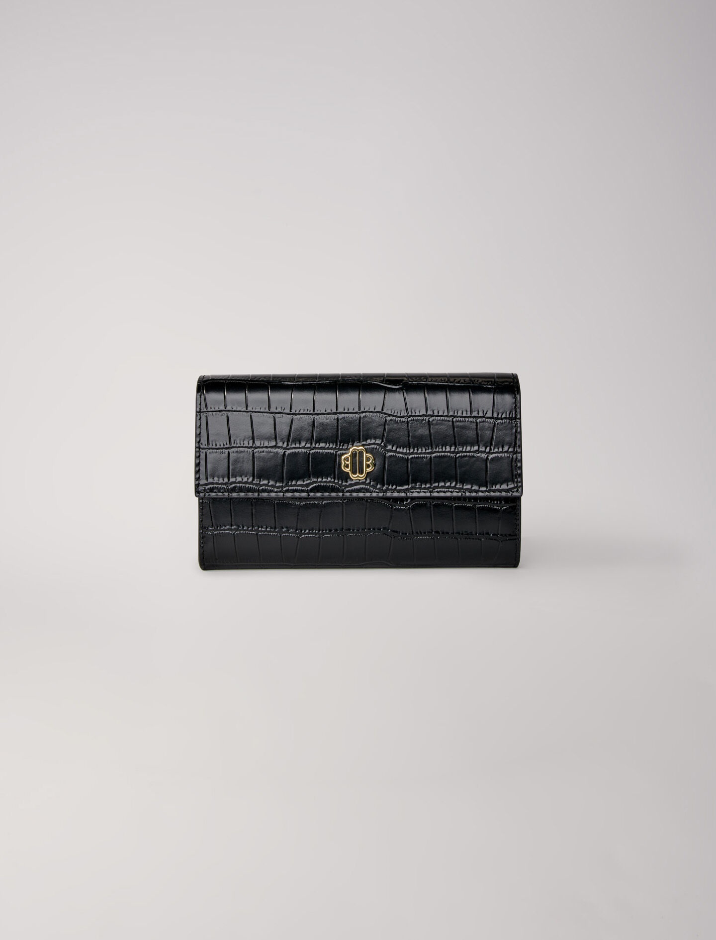 Croc-effect embossed leather bag 1