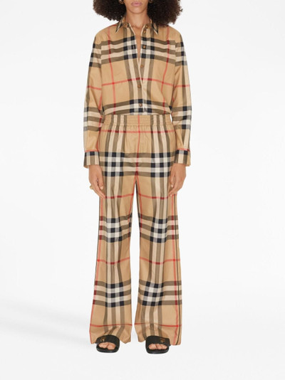 Burberry Check-pattern flared cotton trousers outlook