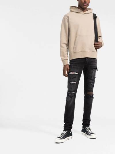 AMIRI ripped slim-fit jeans outlook