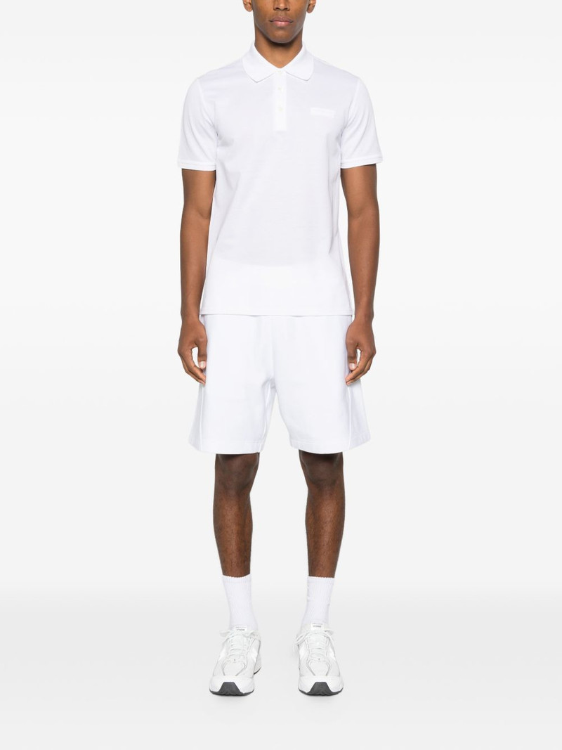 Givenchy logo-patch polo shirt outlook