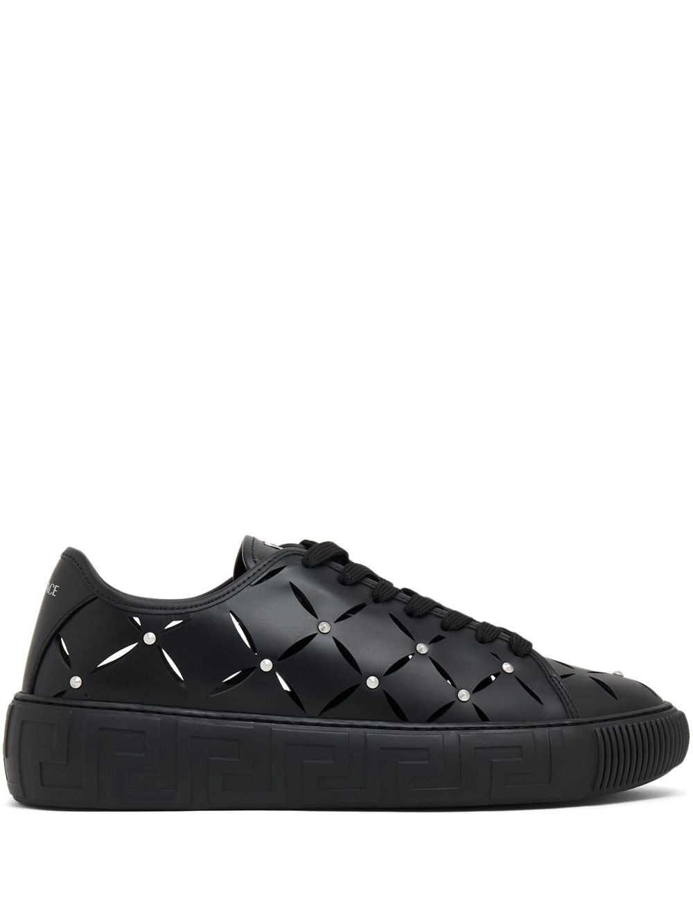 perforated studded sneakers - 1