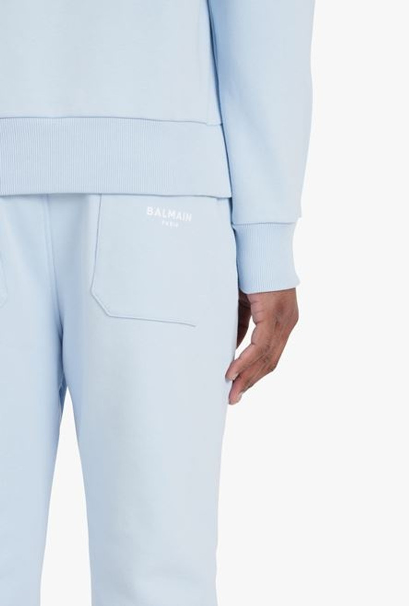 Pale blue eco-designed cotton sweatshirt with small flocked white Balmain Paris logo 8