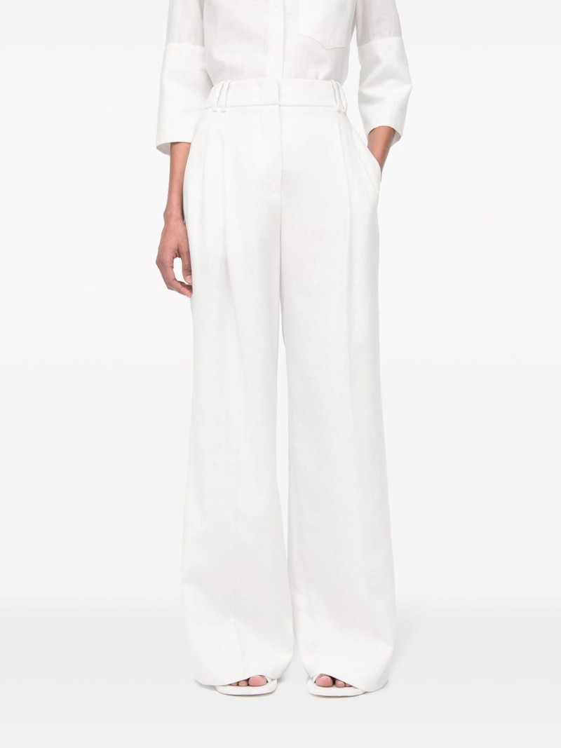 wide-leg pleated linen trousers 6