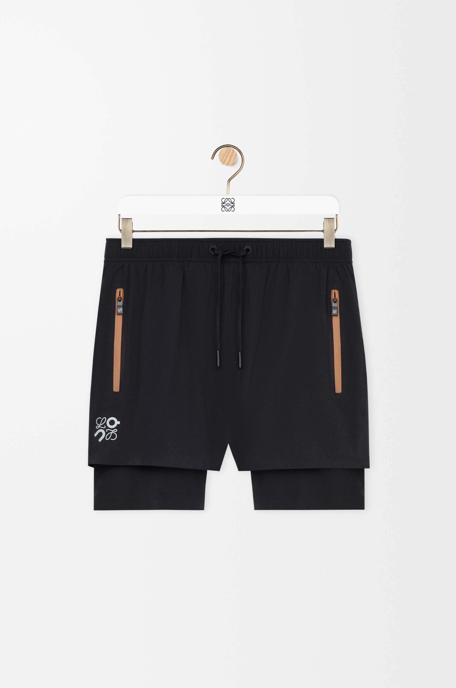 Performance shorts in technical shell - 1
