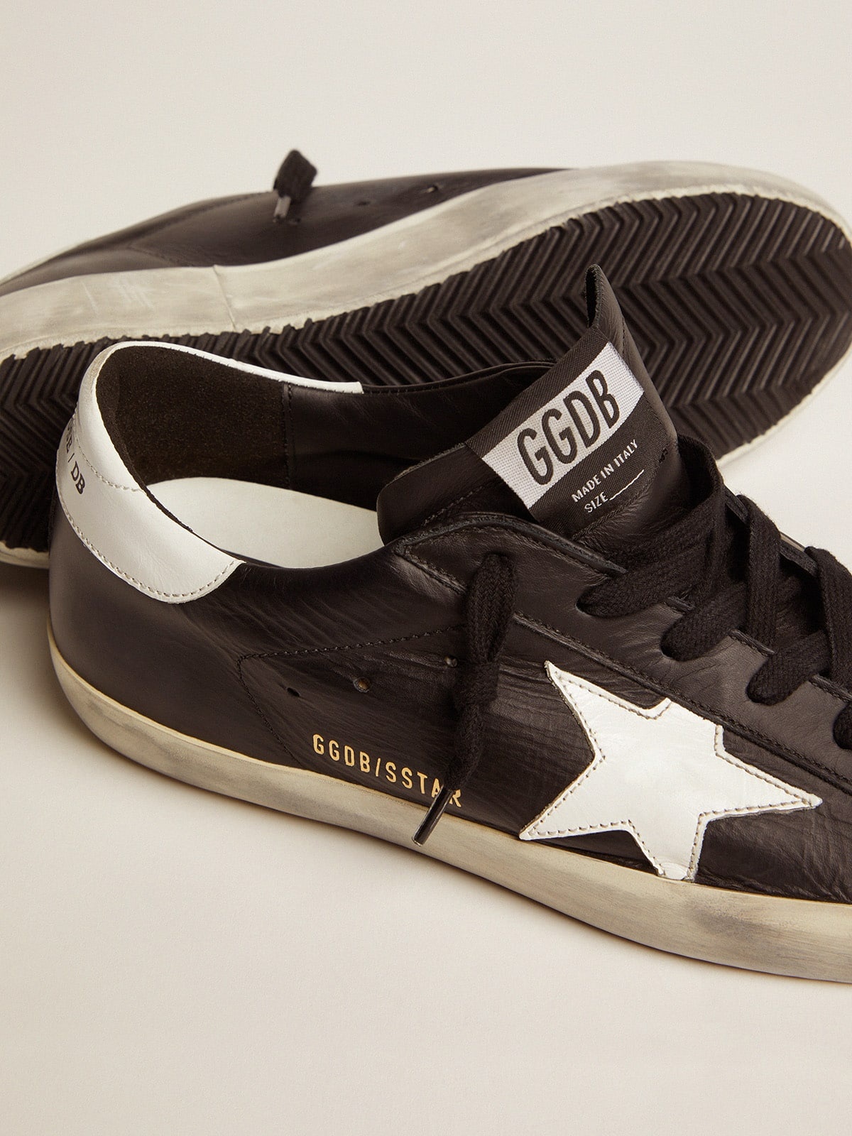 Women’s Super-Star in black leather with white leather star and heel tab - 4