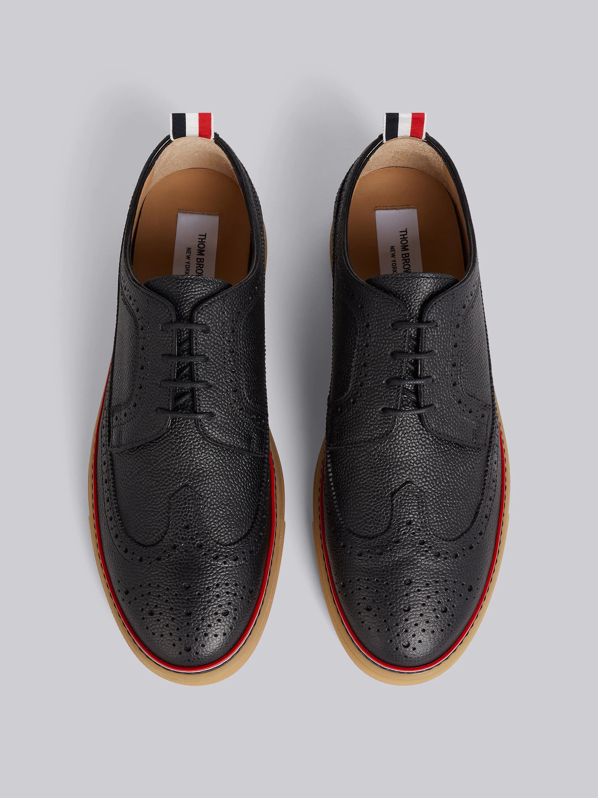 Black Pebbled Calfskin Longwing Brogue Trainer - 4