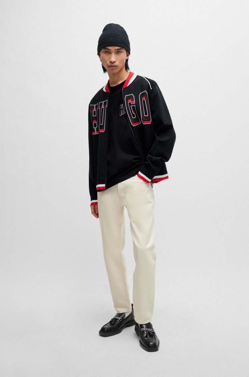HUGO TAPERED-FIT JEANS IN NATURAL DENIM outlook