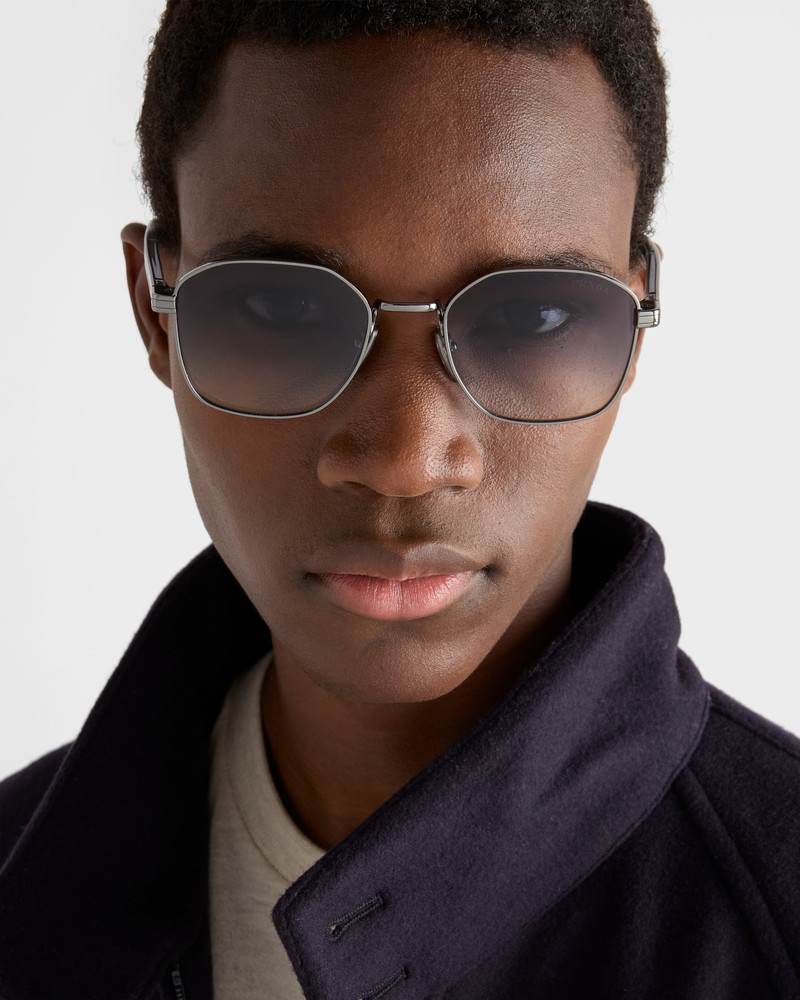 Prada Sunglasses with the iconic metal plaque outlook