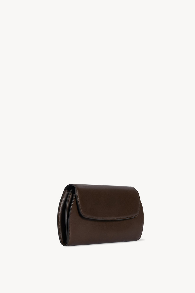 The Row Curved Clutch in Leather outlook