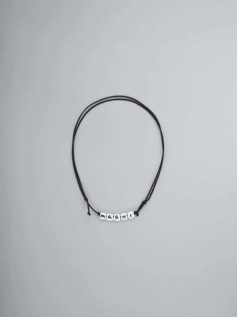 WHITE LOGO NECKLACE 1