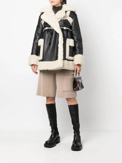 sacai double-breasted leather coat outlook