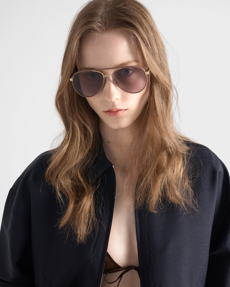 Prada Prada sunglasses with the iconic metal plaque outlook