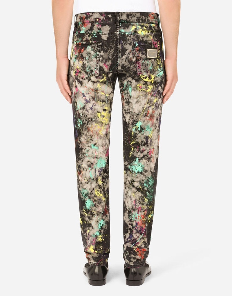 Slim-fit black stretch jeans with marbled print 3