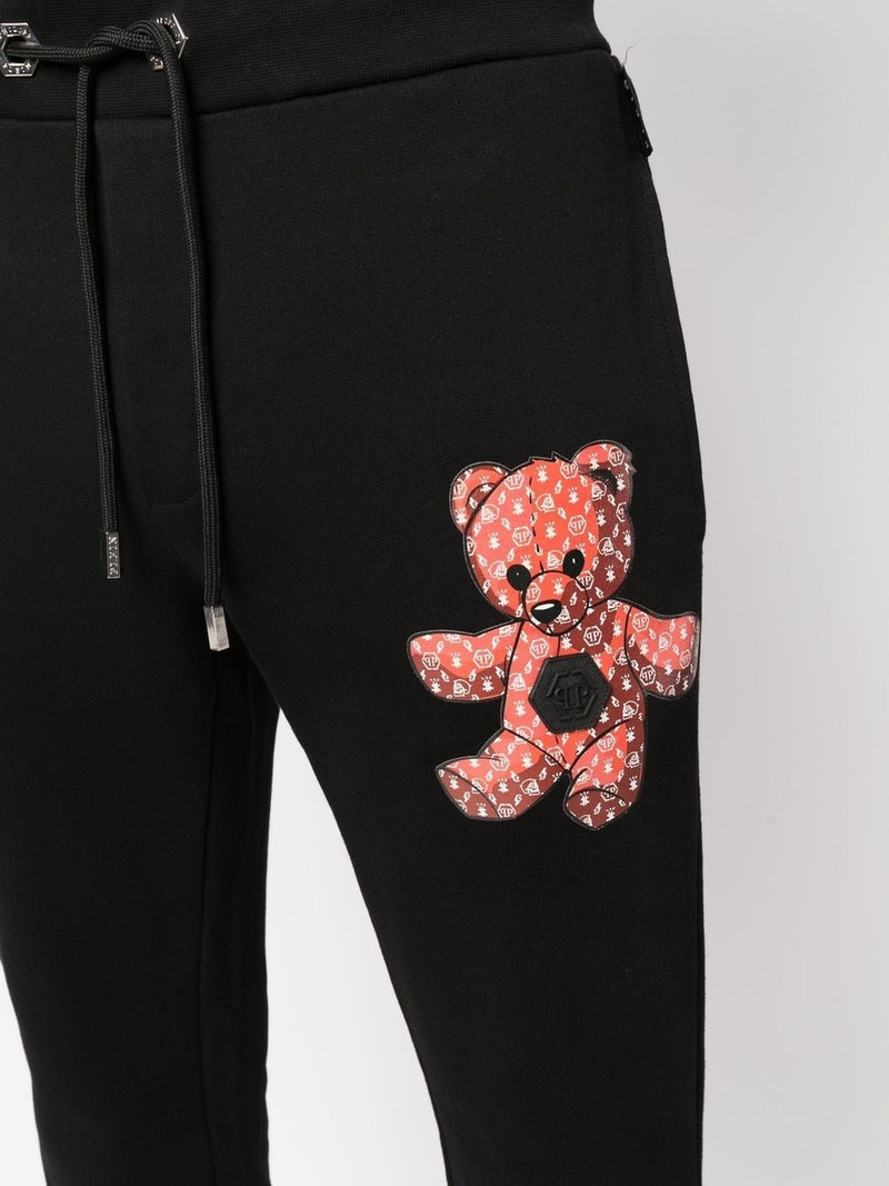 teddy motif track pants 5