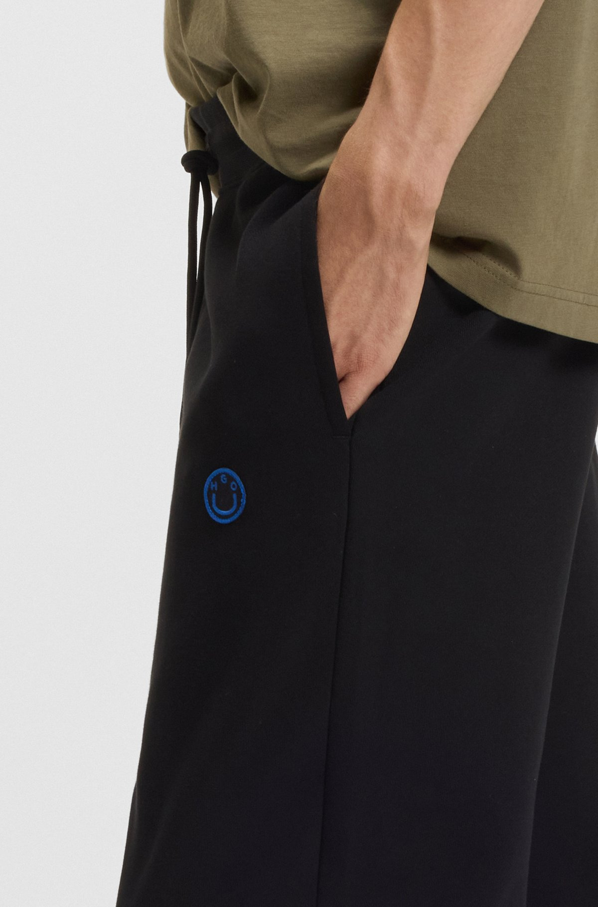 COTTON-TERRY TRACKSUIT BOTTOMS WITH HAPPY HUGO LOGO PATCH - 3