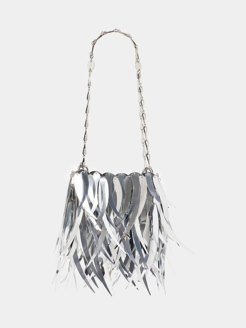 METALLIC SILVER BAG WITH FEATHERS ASSEMBLAGE 1