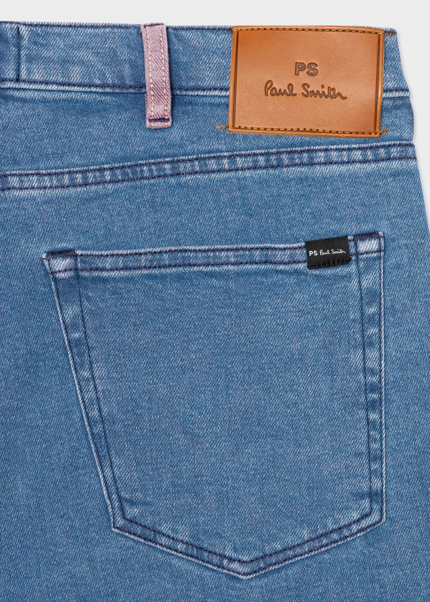 Tapered-Fit Light Wash Jeans With Contrast Detail - 2