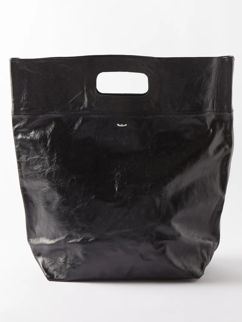 Logo padded tote bag in black - Our Legacy