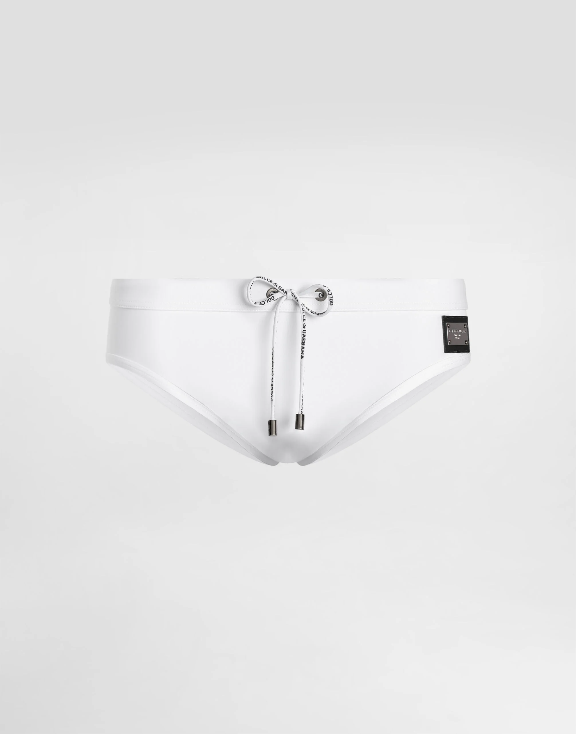 Swim briefs with high-cut leg and branded plate - 1