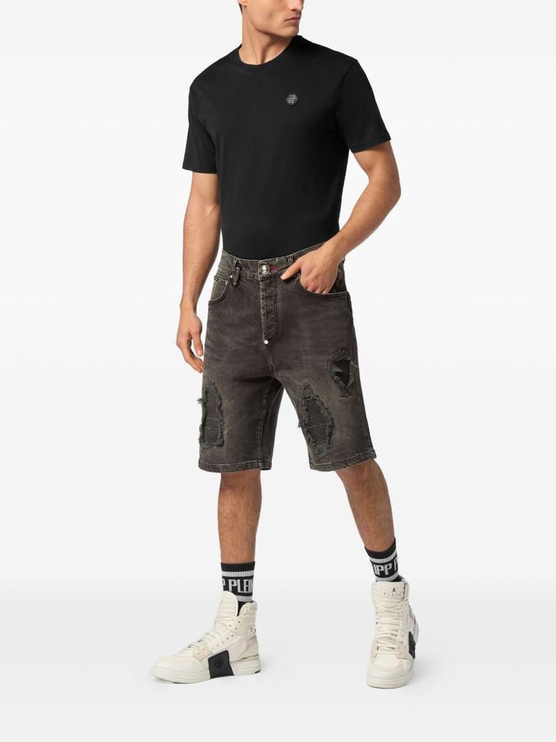 PHILIPP PLEIN distressed shorts outlook
