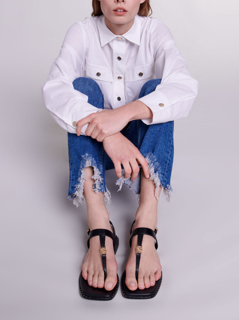 Slim-fit jeans, ripped at the bottom 7