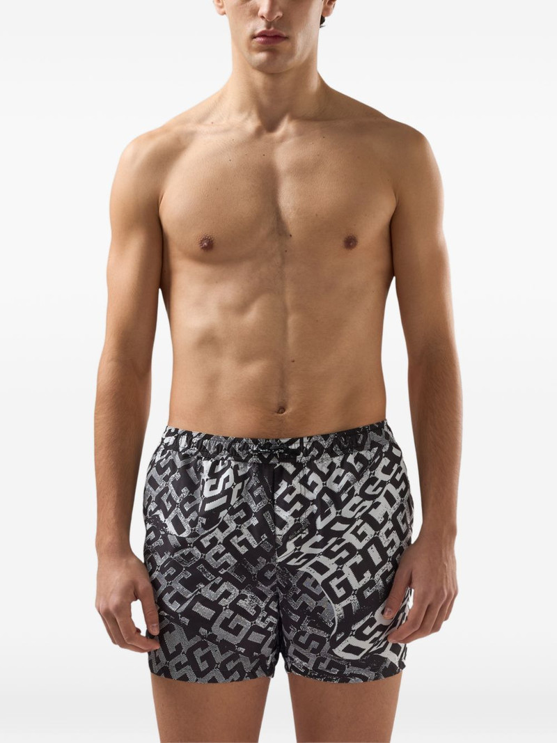 GCDS monogram-pattern swim shorts outlook