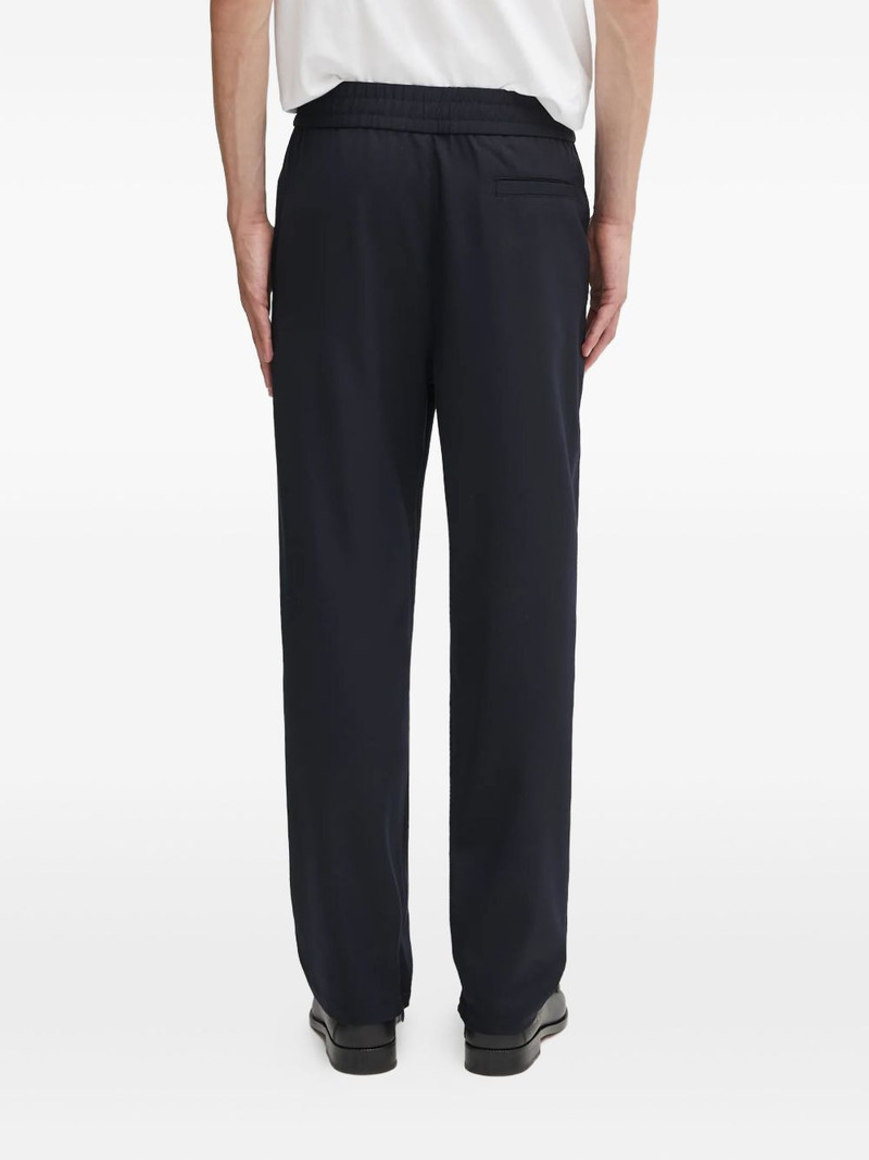 button seam trousers 3