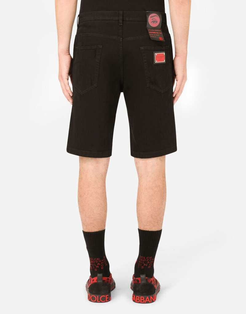 Black denim shorts with rips and patch embellishment 3