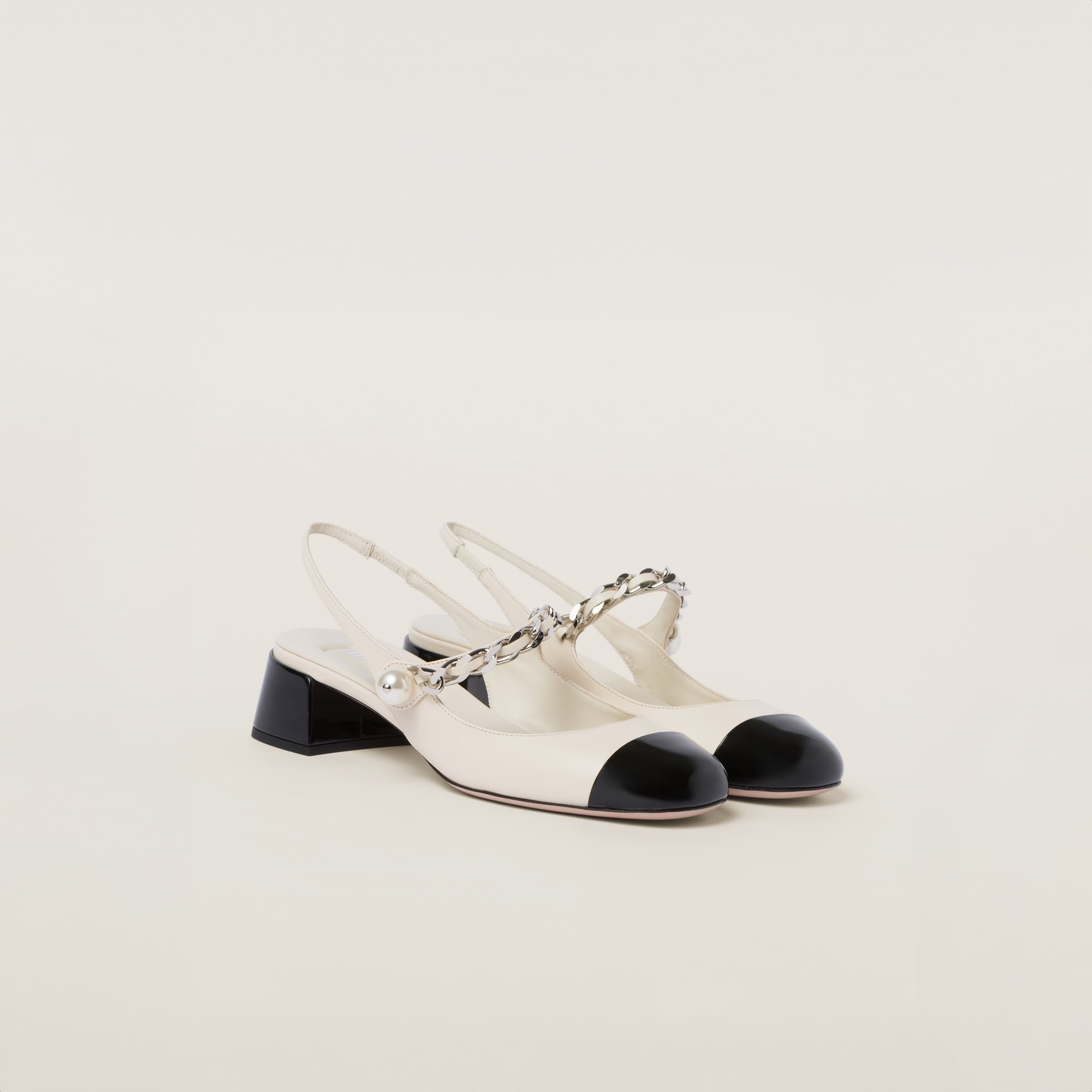 Miu Miu Leather and patent leather slingback pumps | REVERSIBLE