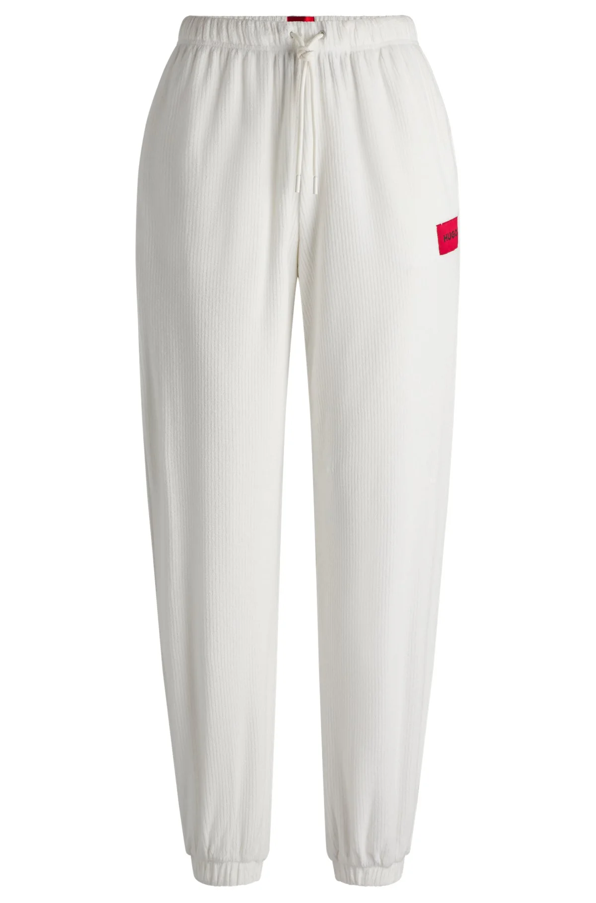 TRACKSUIT BOTTOMS WITH RED LOGO LABEL - 1