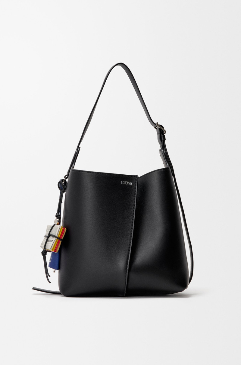 Newspaper charm in calfskin 4